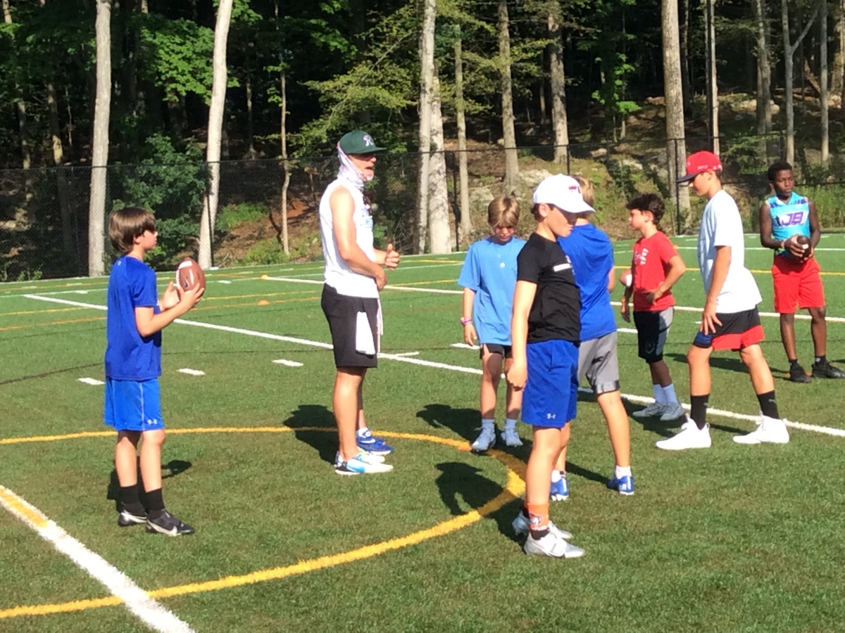 Former NFL quarterbacks Phil, Chris and Matt Simms combined their Simms Complete QB camp with Greenwich Country Day’s Tiger Football Academy